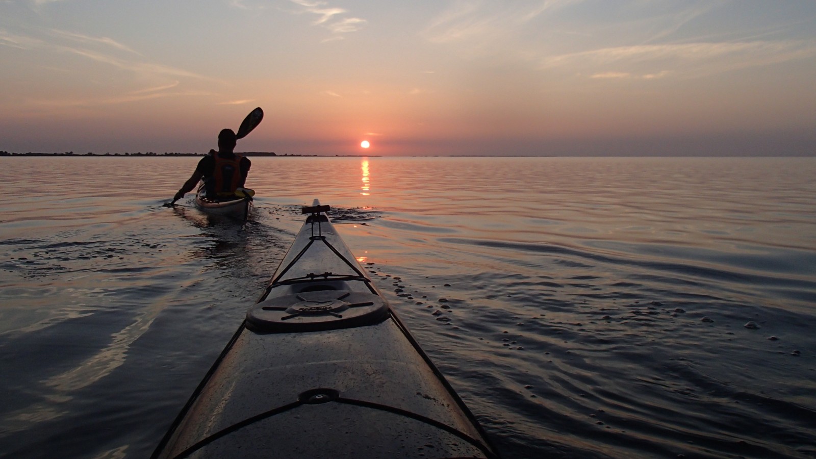 Kajak i solnedgang